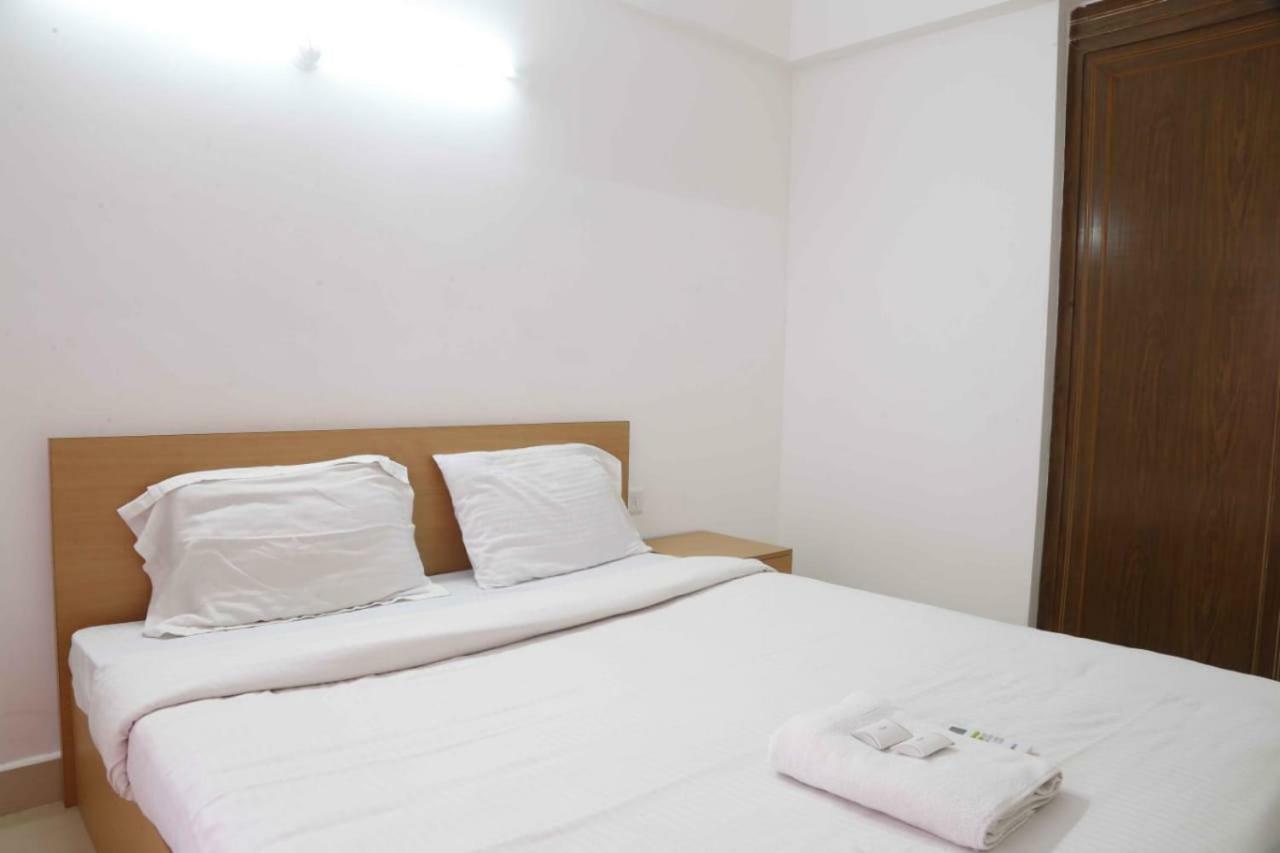 Traven Homes Infopark Kakkanad Corporate Suit Rooms Kochi Exterior photo